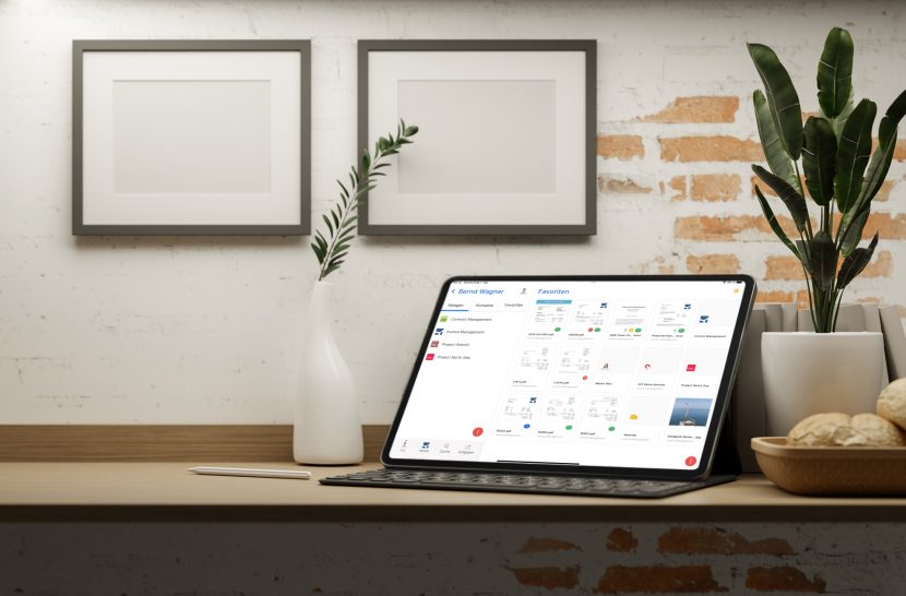 ipad-mockup-placed-on-a-wooden-desk-featuring-some-plants-m22118-r-el2.jpg